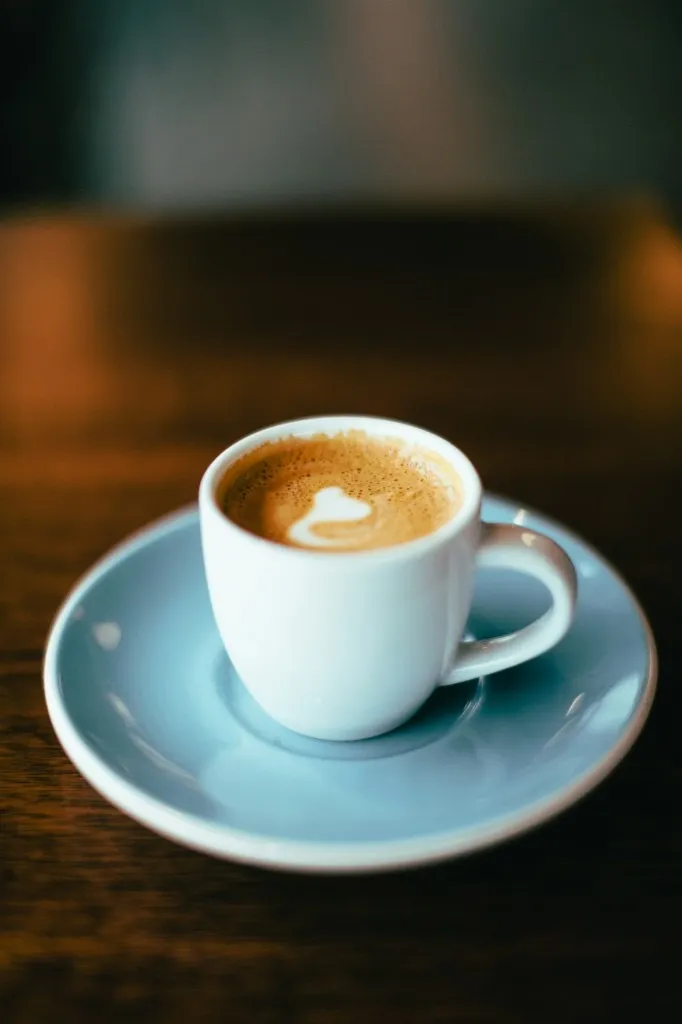 Espresso in a white cup with crema