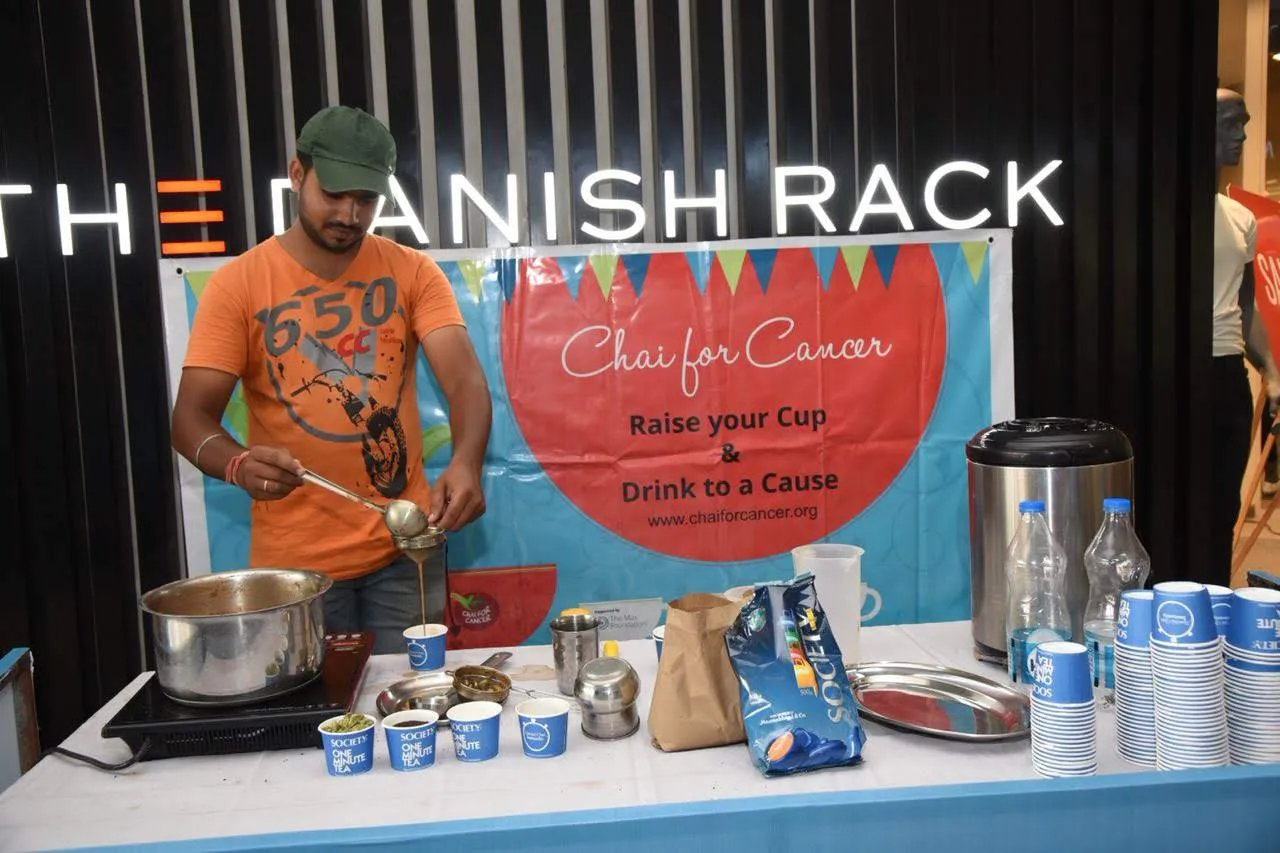 Brewing at the 'Chai for Cancer' fundraiser table